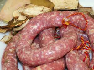 Botifarra amb ceps i ceba confitada